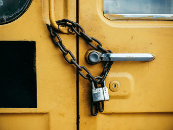 Close-up of padlock on door