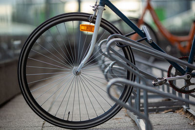 Close-up of bicycle parked on street