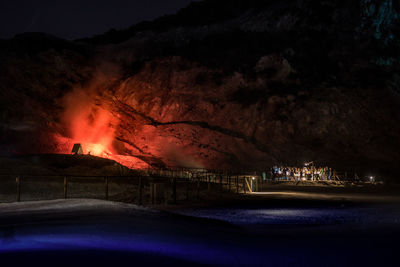 Scenic view of lake against sky at sunset
