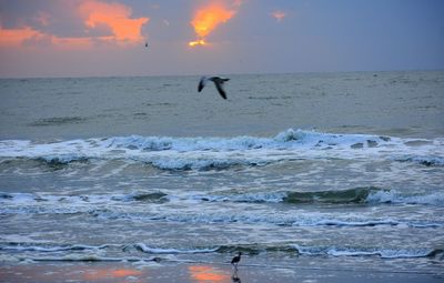 Scenic view of sea against sky during sunset