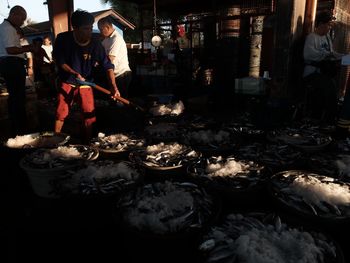 Man working at market stall