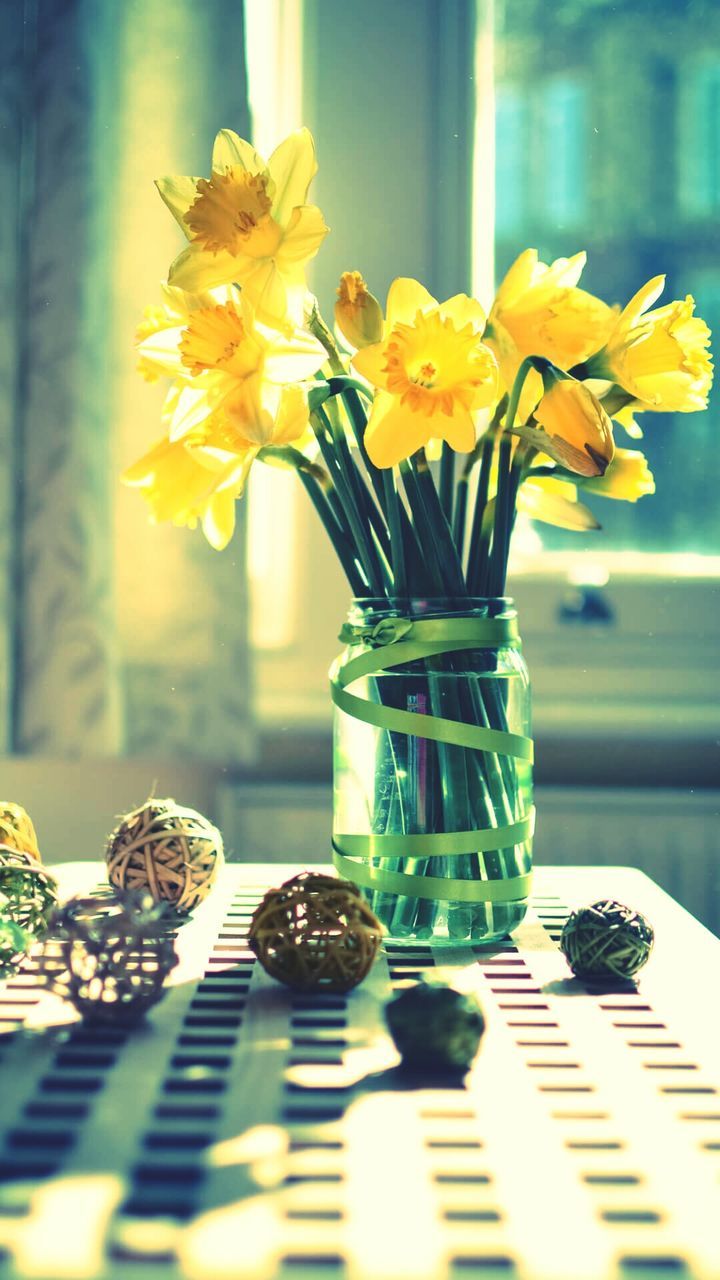 flower, vase, table, still life, fragility, nature, indoors, flower head, close-up, window, freshness, beauty in nature, petal, yellow, no people, tulip, flower arrangement, bouquet, day, gerbera daisy