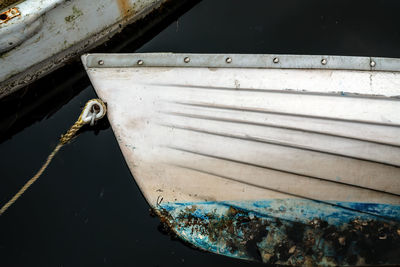 High angle view of rusty boat moored at shore