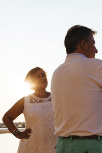 Senior couple outdoors at sunset