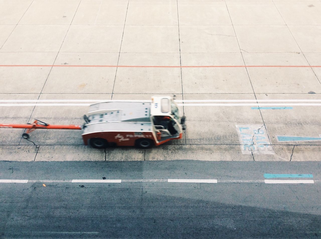 HIGH ANGLE VIEW OF CAR ON STREET