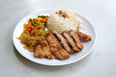 Close-up of cooked food in plate