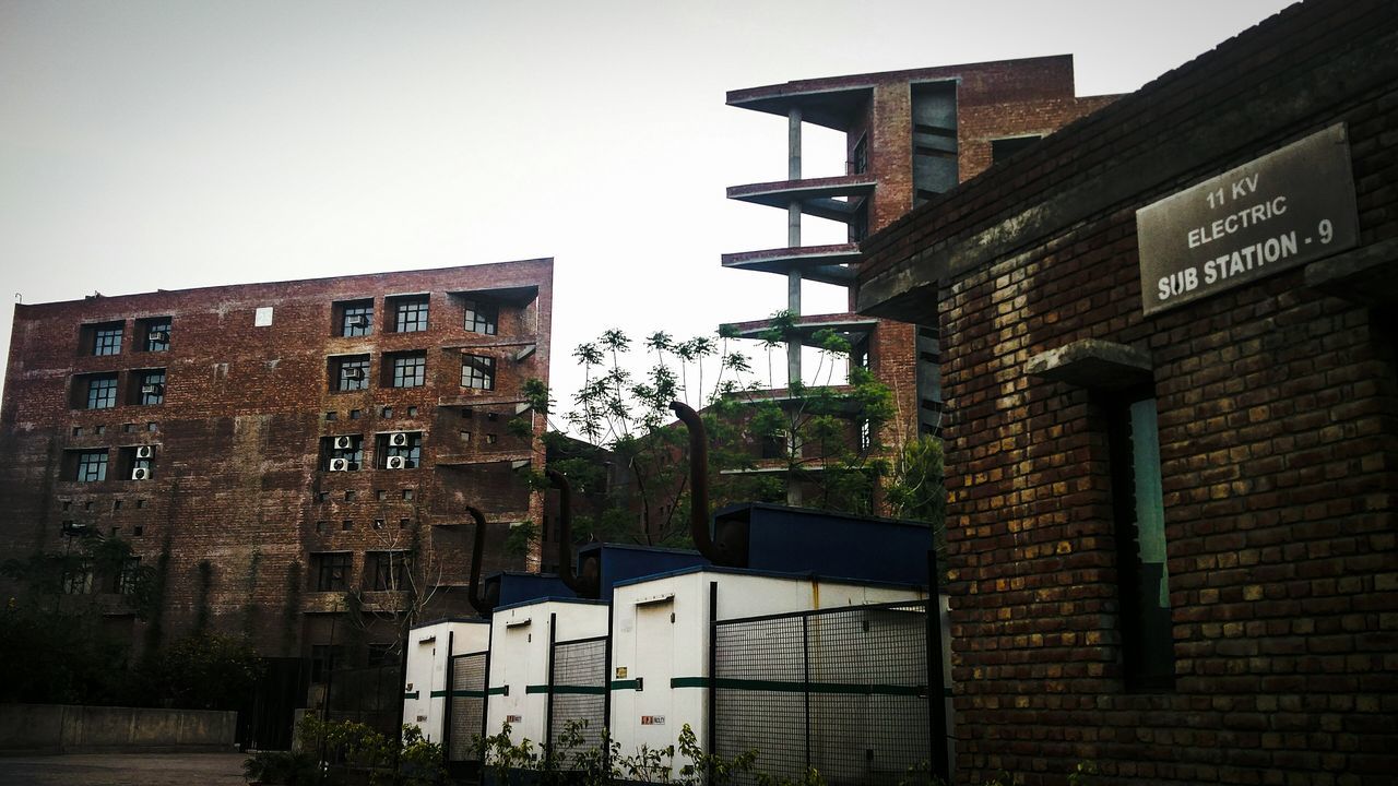 VIEW OF BUILDINGS IN CITY AGAINST SKY