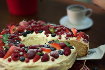 Close-up of cake served on table