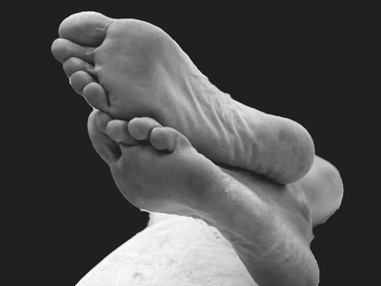 black and white, black background, arm, monochrome photography, limb, studio shot, human leg, hand, finger, monochrome, one person, close-up, adult, human foot, indoors, human limb, white