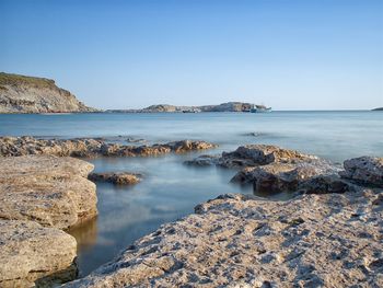 Scenic view of sea against clear sky