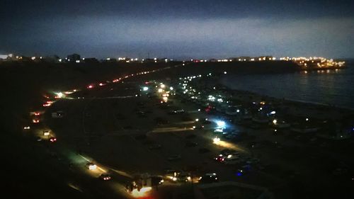 Illuminated street light at night