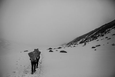 Scenic view of snow covered landscape