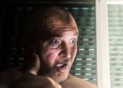 Portrait of shirtless man