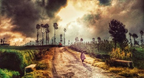 View of landscape against cloudy sky