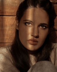 Close-up portrait of a serious young woman