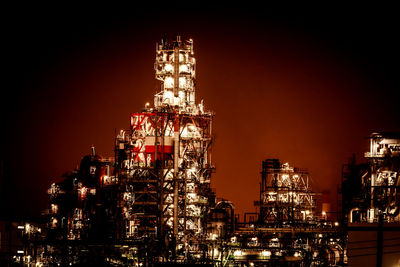 Illuminated buildings in city at night