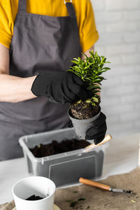 Midsection of man preparing food