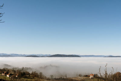Dense fog over rural fields in west serbia