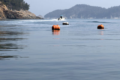 View of floating buoy in sea