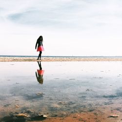 People walking on beach