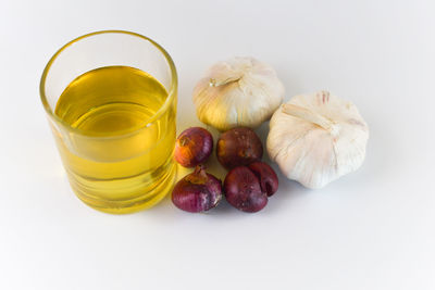 Close-up of fruits against white background