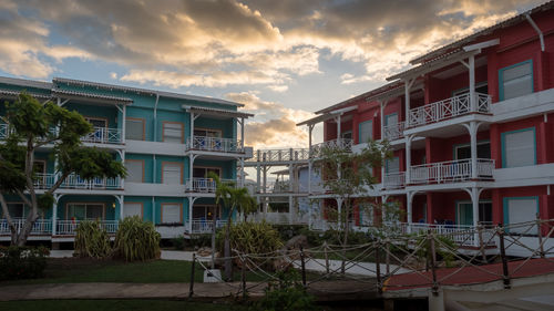 Buildings against sky during sunset