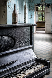 Close-up of old window of abandoned building