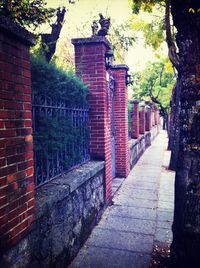 Building along brick wall