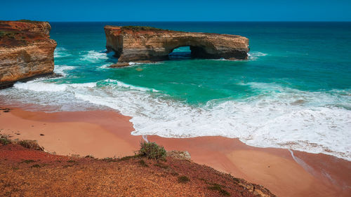 Scenic view of rock formation in sea