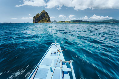 Boat in sea against sky