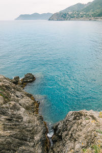 Scenic view of sea and mountains