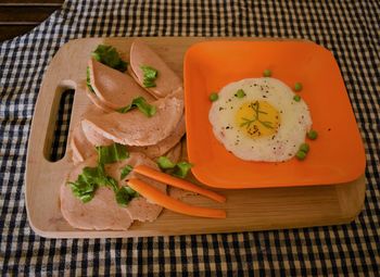 High angle view of breakfast served on table