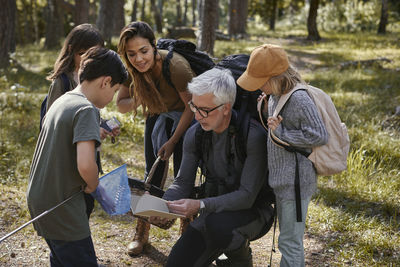 Family together in forest