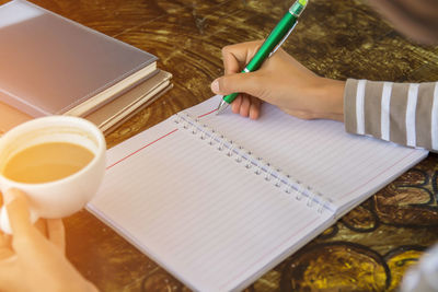 High angle view of coffee cup on table