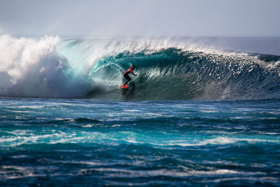 Man surfing in sea