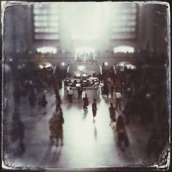 Blurred motion of people in city