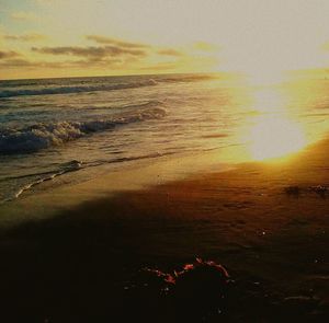 Scenic view of sea at sunset