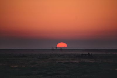 Scenic view of sunset over sea