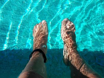 Low section of people in swimming pool