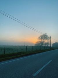 Road against sky during sunset