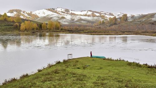 Scenic view of lake and mountains