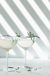 Close-up of wineglasses on table