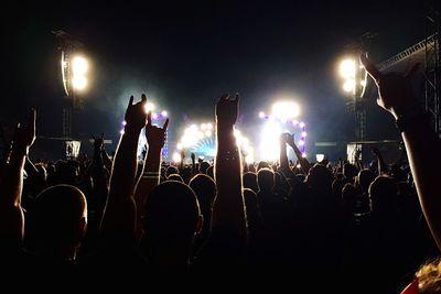 People enjoying music concert