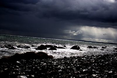 Close-up of sea against cloudy sky