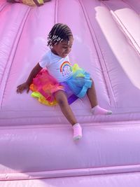 Grand daughter in bounce about on her birthday 