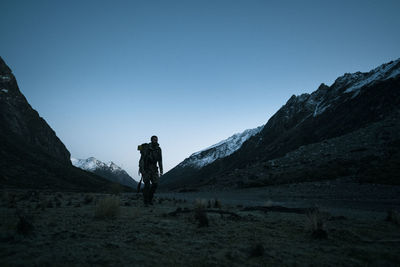 View of hunter in mountains