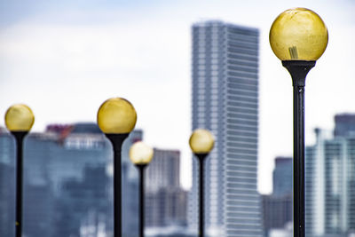 Lighting equipment against buildings and sky