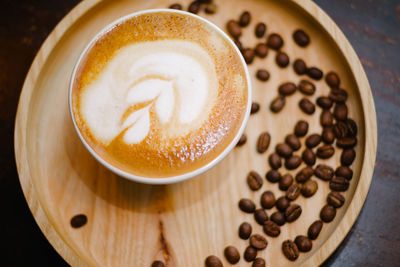 High angle view of cappuccino on table