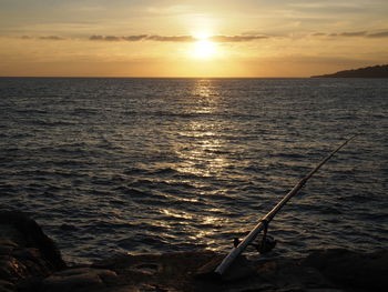 Scenic view of sea against dramatic sky