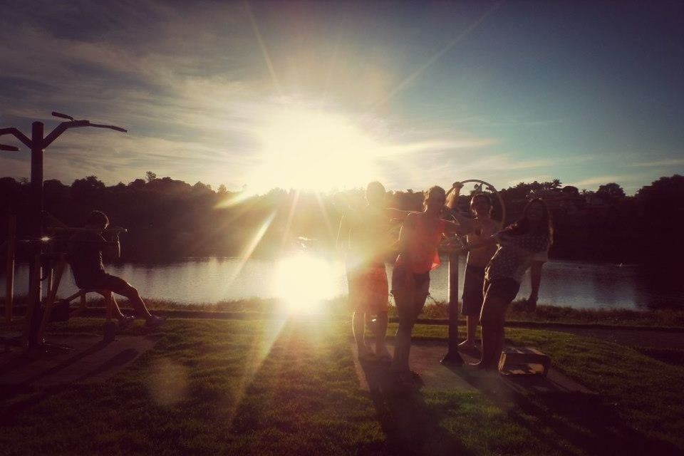 sun, men, lifestyles, sunbeam, leisure activity, sunlight, lens flare, togetherness, person, large group of people, medium group of people, sky, sunset, tree, silhouette, full length, outdoors, sunny, friendship